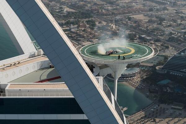 Red Bull celebrate by doing donuts on top of the helipad atop the Burj in Dubai